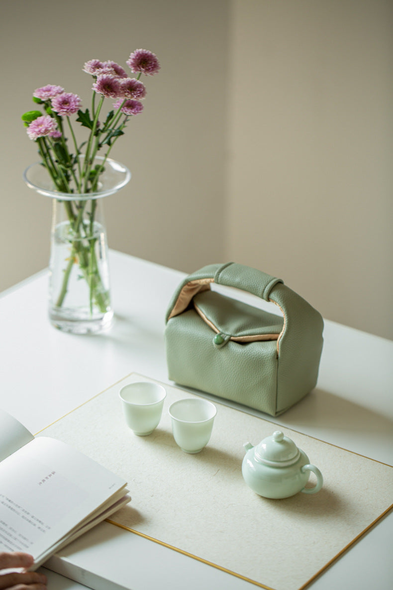 This is a ceramic teapot