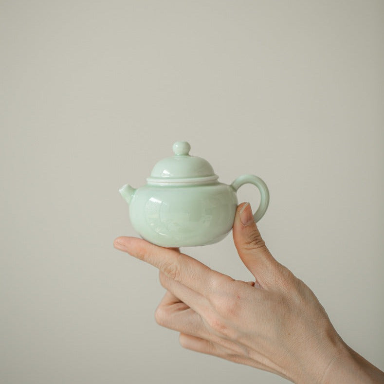 This is a ceramic teapot