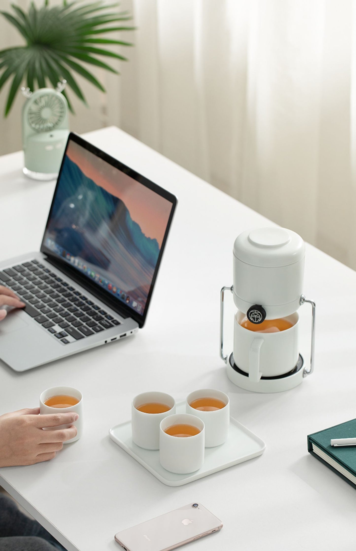 this is an automatic ceramic teapot warmer set