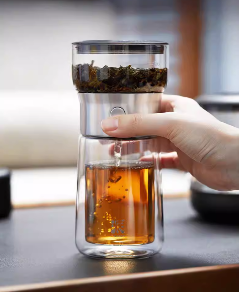 this is an automatic glass teapot travel set