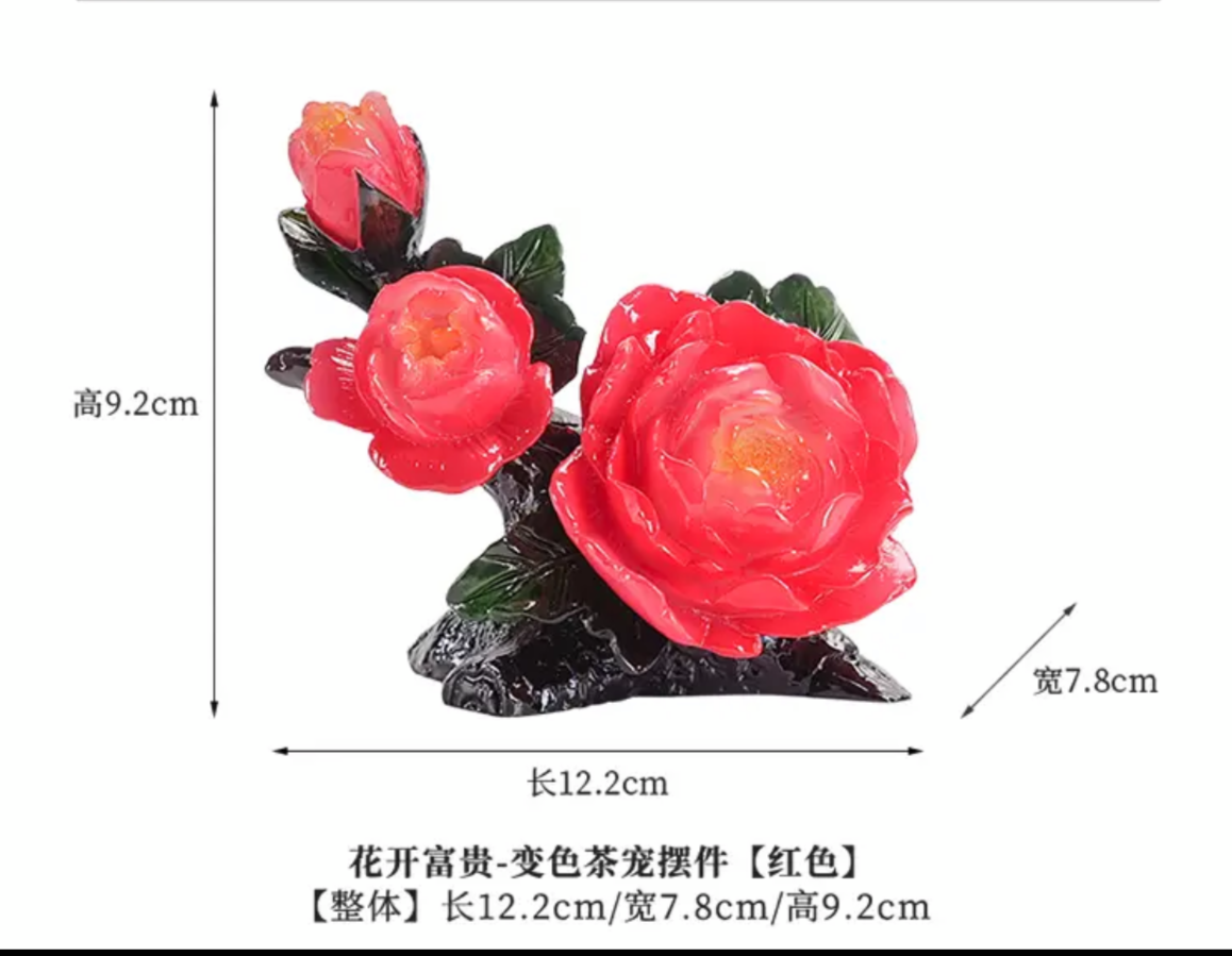 This is a color changing peony flower teapet.this is a resin teapet