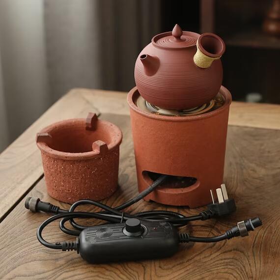 This is a pottery side handle kettle