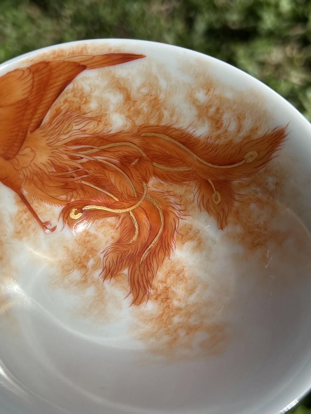 this is a Chinese Jingdezhen alum red phoenix teacup.this is a ceramic teacup