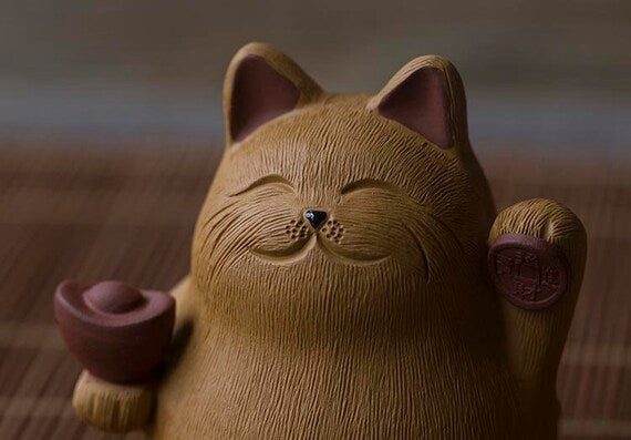 This is a Yixing purple clay Maneki-Neko teapet