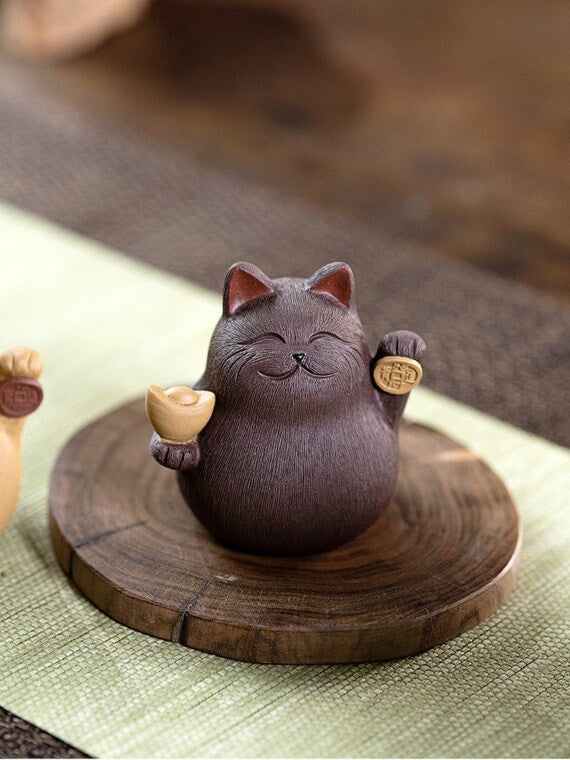 This is a Yixing purple clay Maneki-Neko teapet