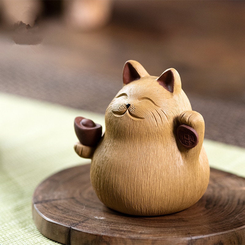 This is a Yixing purple clay Maneki-Neko teapet