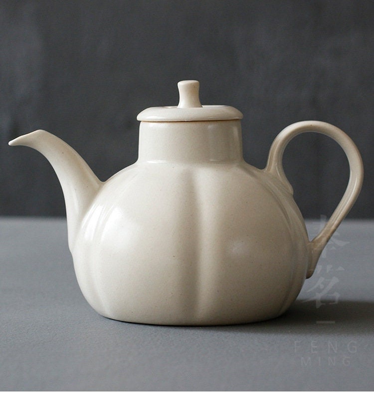 This is a wood ash glaze kettle