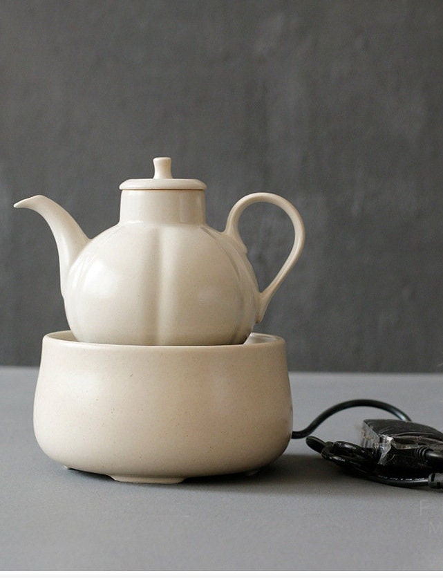 This is a wood ash glaze kettle