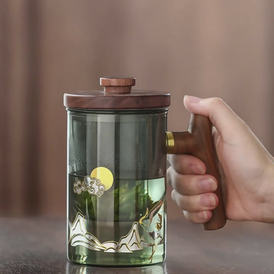 This is a glass teapot travel set