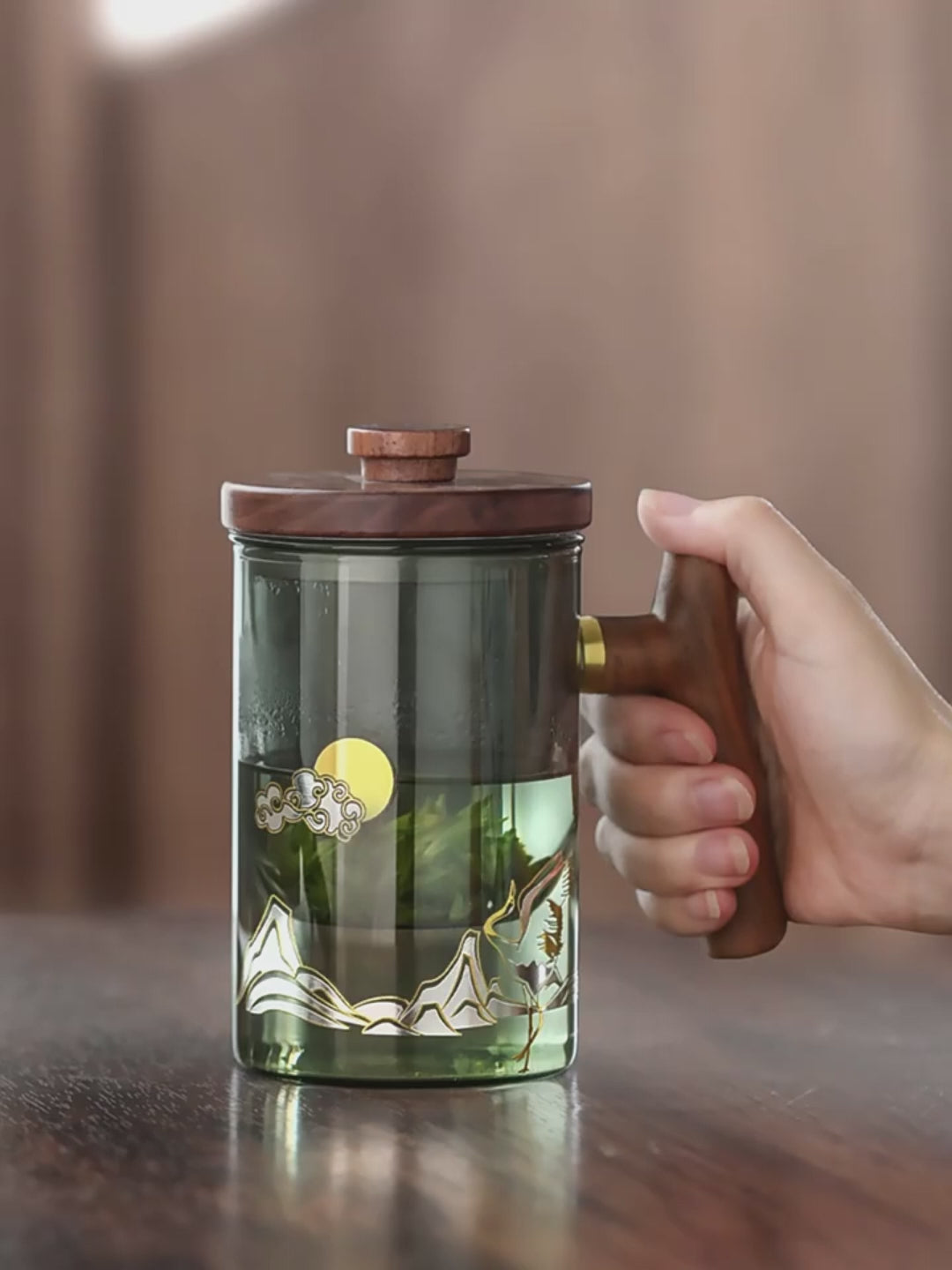 This is a glass teapot travel set